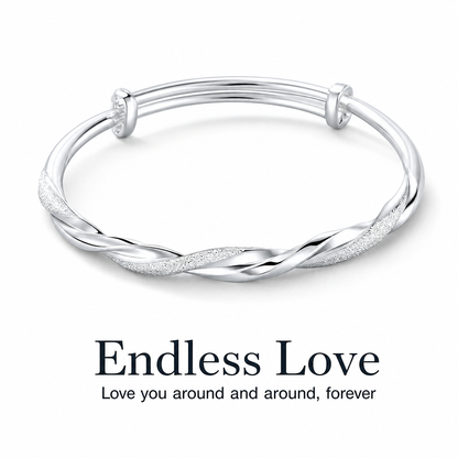 🎁2026 New Arrivals 50% OFF💥 Endless Mobius-twisted bangle – smooth, sliding adjustable clasp & double-textured premium shine 💫